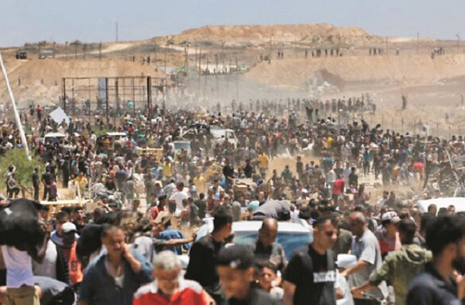جی ایچ ایف کے امدادی مراکز پر بھوکےلاچار فلسطینیوں پرگولہ بارود، دستی بم اورپیپراسپرےاستعمال کیاگیا