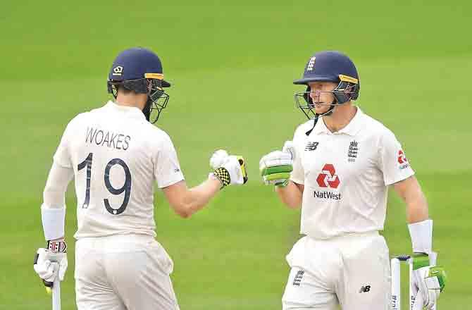 Butler and Woakes - Pic : PTI
