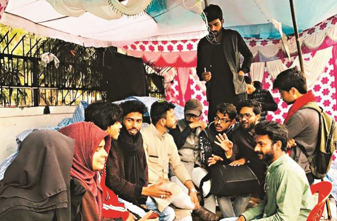 Students can be seen outside the Aligarh Muslim University. Picture Inquilab