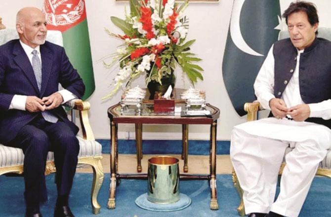 Imran Khan and Ashraf Ghani - Pic : Agency