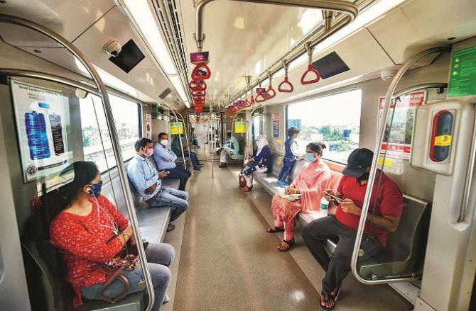 Lucknow: Passengers Can Be Seen In A Metrotrain. Picture:PTI