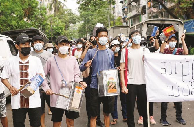 Demonstrators in various parts of Burma chanted slogans against the military coup.Picture:PTI