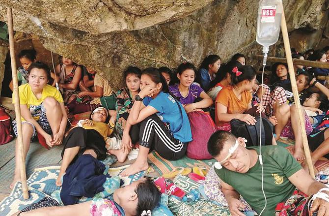 Members of Myanmar`s Karen community displaced by the bombing.Picture:Agency