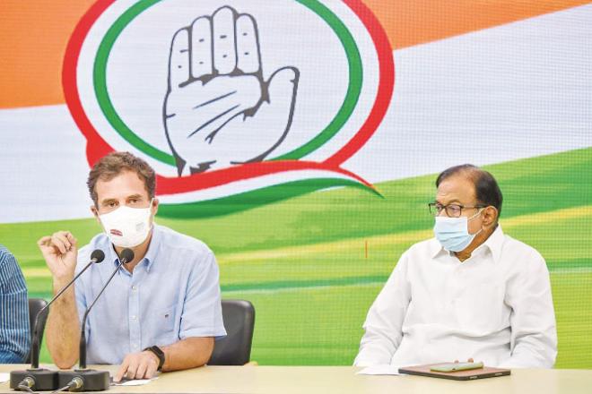 Rahul Gandhi addressing a press conference. Along with P. Chidambaram. Picture:PTI
