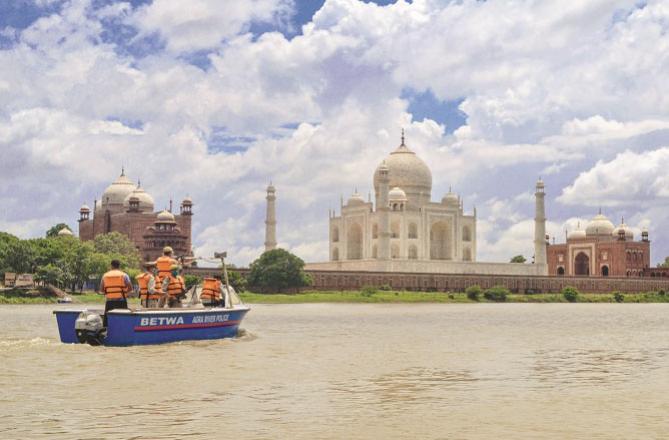 Policemen in the Jumna River behind the Taj Mahal. Picture:PTI