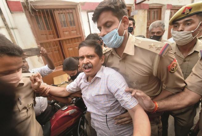 Police officers dragged Amitabh Thakur from his house to the police station.Picture:PTI