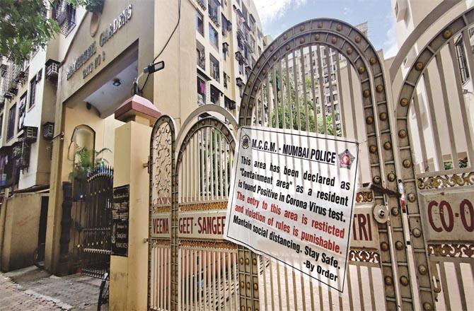 BMC notice is visible at the gate of Kandioli Housing Society.picture:Inquilab