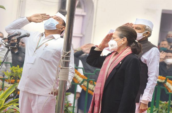Congress President Sonia Gandhi saluting the party flag. (PTI)