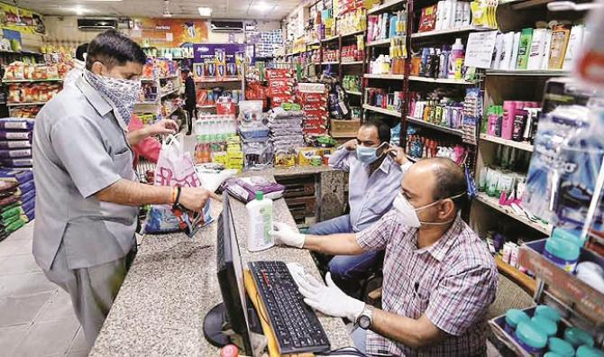 At a general store, customers pay for items purchased..Picture:INN