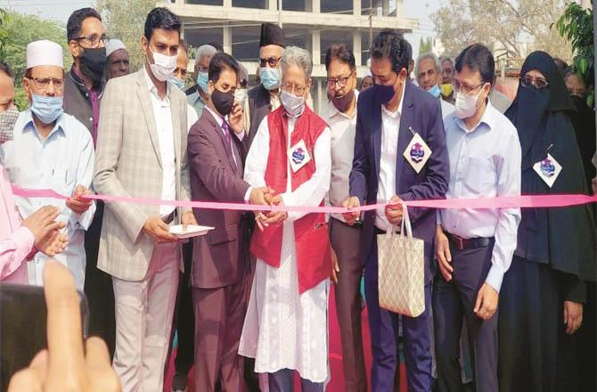 Leading journalist Hassan Kamal inaugurating a book fair in Malegaon.