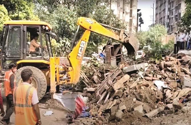 The mud house in Azadnagar, which used to be a drug den, is being demolished.