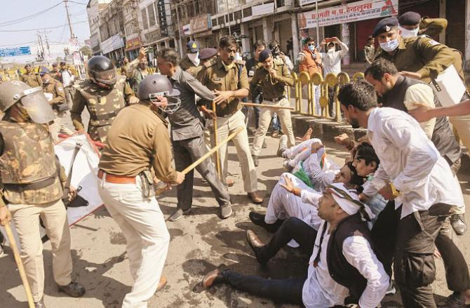 In Bhopal, police beat Congress workers with sticks..Picture :PTI