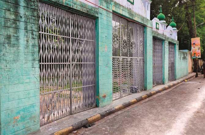 Doors closed after stopping cleaning at the main Eidgah in Benajhabar.Picture:Inquilab