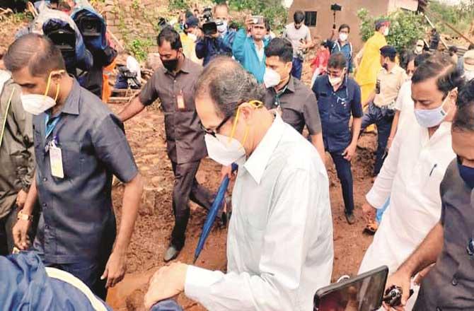 Chief Minister Uddhav Thackeray reached the victims of Tarai village walking on mud.Picture:INN