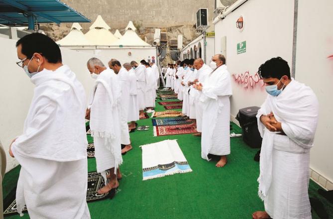 Hajj pilgrims praying after reaching Mina.Picture: Courtesy Arab News