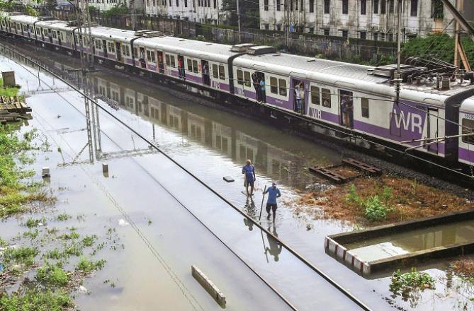 Train tracks appear to be submerged .Picture:PTI