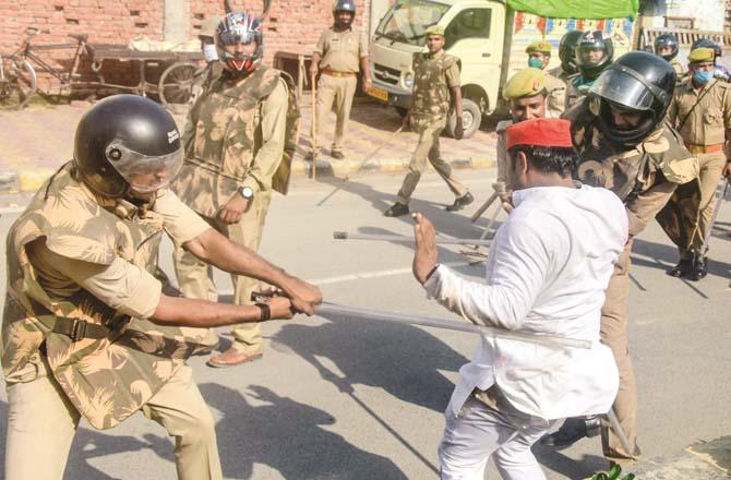 In Allahabad, Samajwadi Party workers protesting against the results were charged with batons. (PTI)