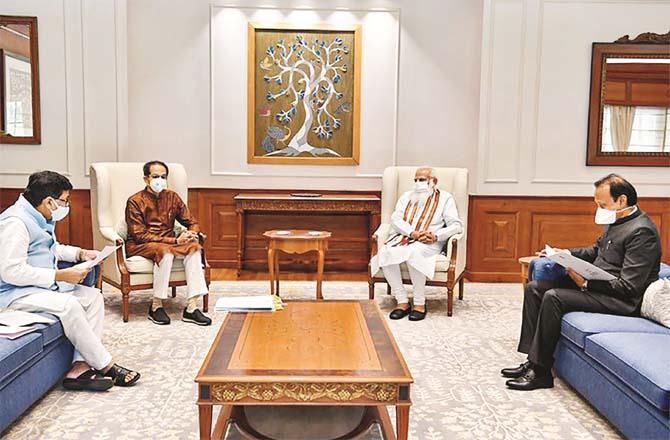 Chief Minister Uddhav Thackeray, Ajit Pawar and Ashok Chavan during a meeting with the Prime Minister.