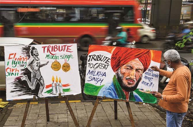 An artist pays homage to Milkha Singh in Mumbai. (PTI)