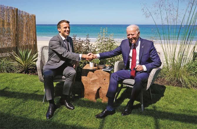 US President Joe Biden with his French counterpart Emmanuel Macron. (Picture:PTI )