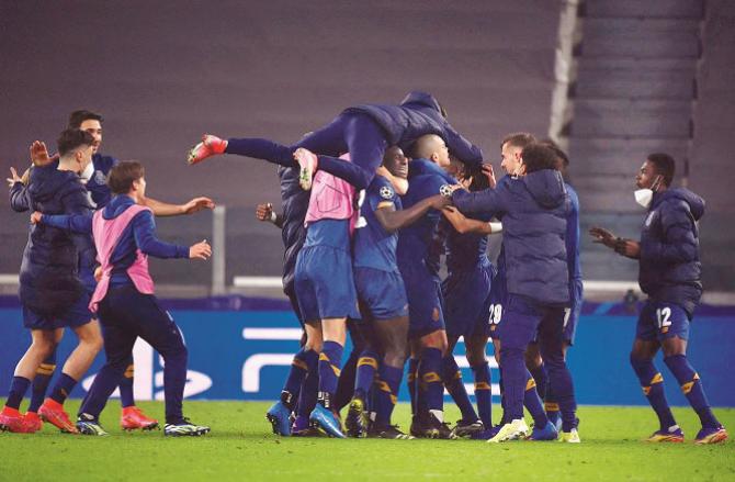 Porto football club players can be seen excited after winning the match.Picture:PTI