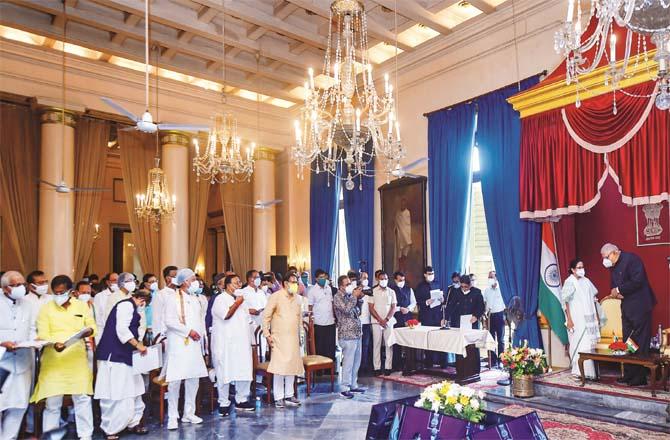 Chief Minister Mamata Banerjee with Governor Jagdeep Dhankar at Raj Bhavan on the occasion of swearing in ceremony.Picture:INN