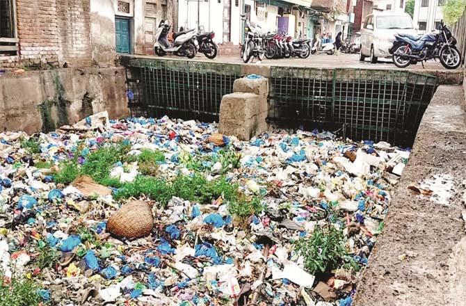 Garbage piles can be seen in most of the city`s drains.Picture:Inquilab