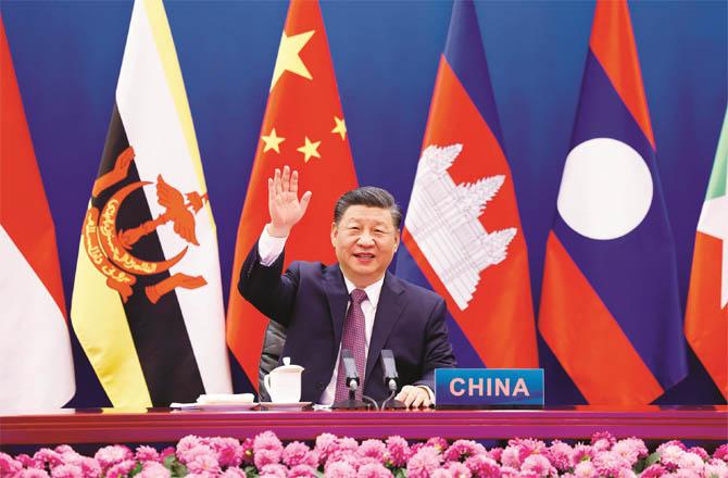 Xi Jinping addressing a virtual meeting (Photo: Agency)