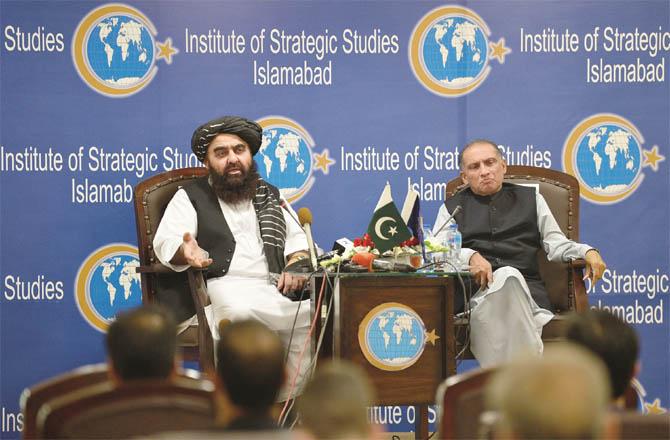 Amirullah Khan Muttaqi (left) answering questions during the program (Agency)
