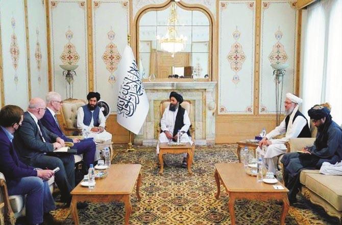 Mullah Abdul Ghani Baradar during a meeting with the British delegation in Kabul.