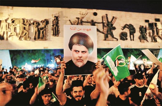 Muqtada al-Sadr`s party has emerged as the largest party in Iraq`s National Assembly. His supporters celebrate the victory. (Photo: Agency)