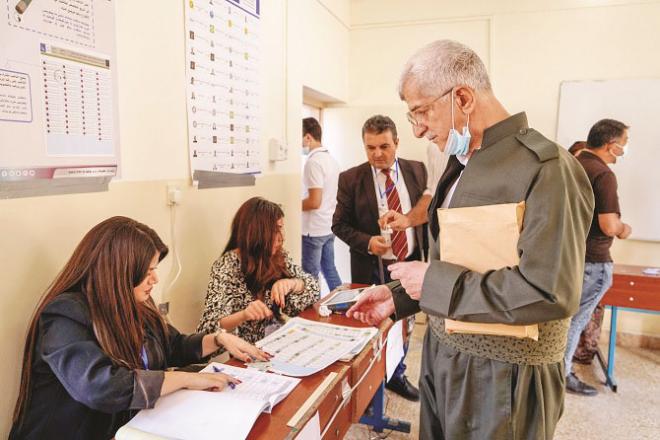 Citizens arrive to cast their ballots at a polling booth in Iraq.Picture:INN