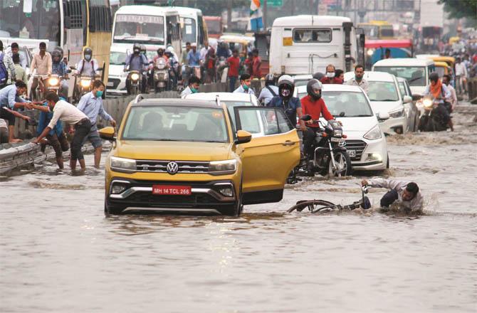 Roads in Haryana`s Gurgram are flooded with ponds (Photo: PTI)