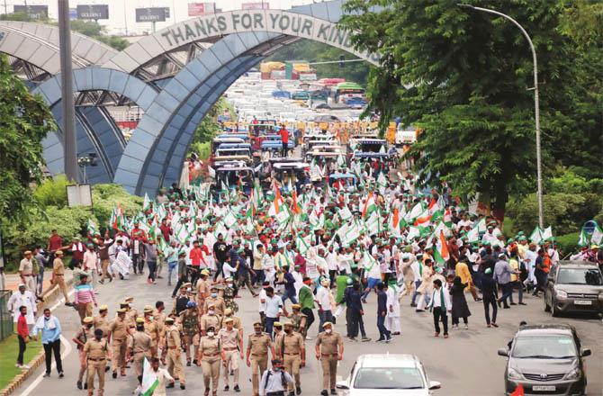 During a farmers` protest march in Greater Noida on Monday. (Photo: PTI)