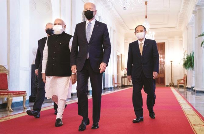 Joe Biden, Narendra Modi, Scott Morrison and Yoshida Suga on their way to a meeting.Picture:PTI