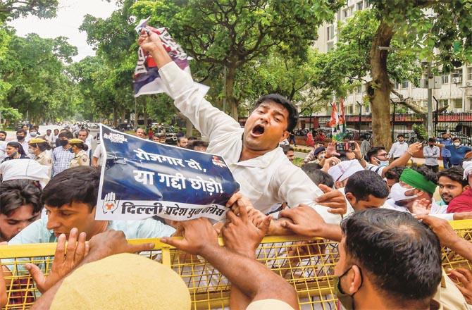 Youth Congress workers protested in several places in Delhi. Police had to set up barricades to stop them:Picture:PTI