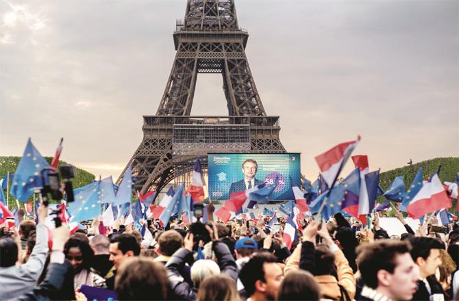 Celebrations take place near the Eiffel Tower following the success of the Emma Noel Makers. (AP / PTI)