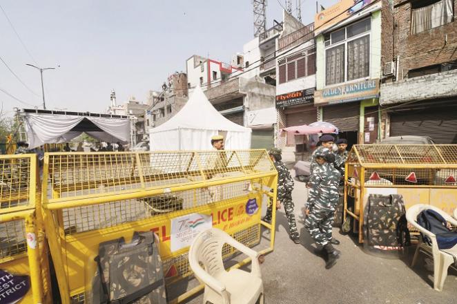 There is a complete police presence in Jahangirpuri area at present Searc. Picture:PTI