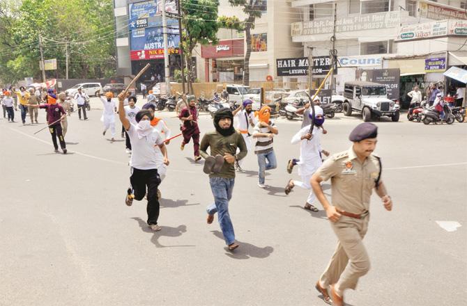 During the violence, angry mobs also chased the police. (PTI)