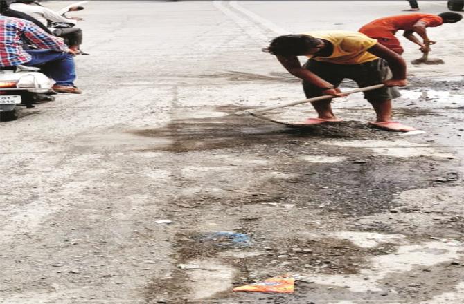 BMC officials are removing mud and sand