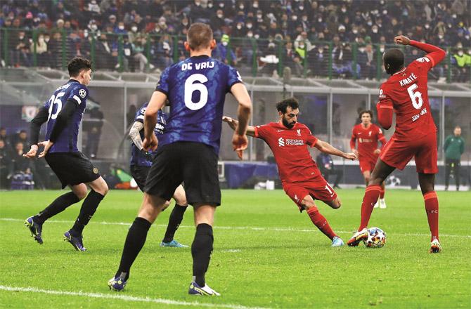 Liverpool`s Mohamed Salah scoring against Inter Milan.