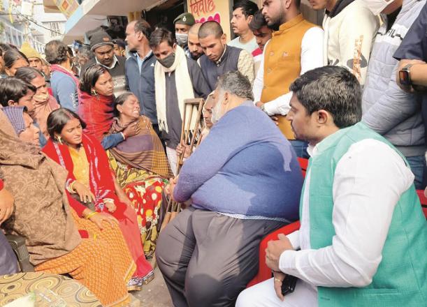 Jan Adhikar Party chief Pappu Yadav with the family of a man who died of alcoholism..Picture:INN