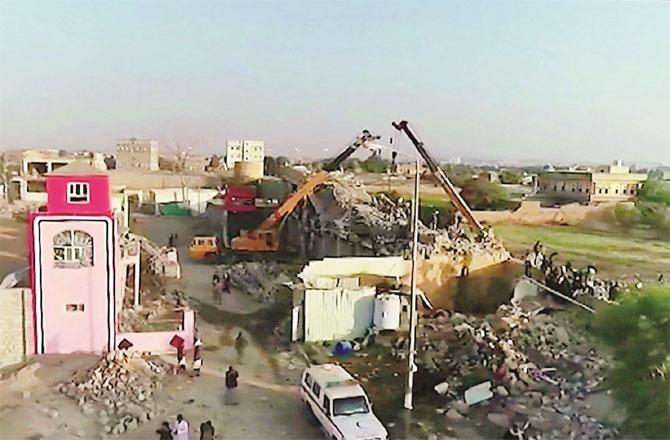 Photo taken from a video provided by Houthi rebels showing the rubble of a prison building.