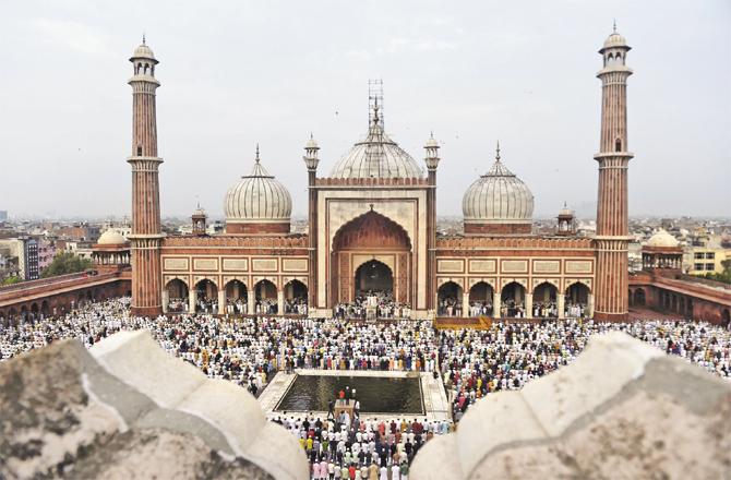Spiritual scenes of double prayers across the country are pictured at the Jama Masjid in Delhi