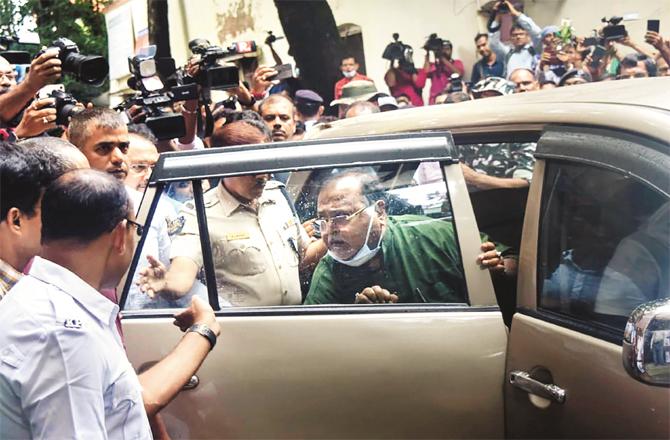 Investigating state minister Partha Chatterjee being taken to court. (PTI)