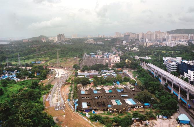 Metro Line 3 and the car shed being built for it in Aarey Colony can be seen