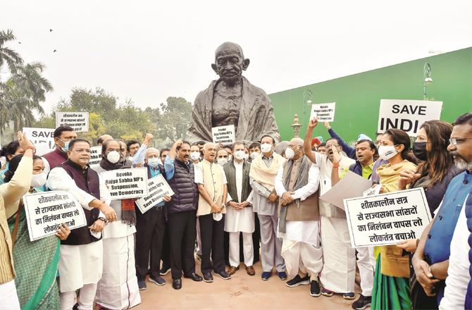 Opposition members have been protesting in front of the statue of Mahatma Gandhi in the Parliament premises. (PTI)