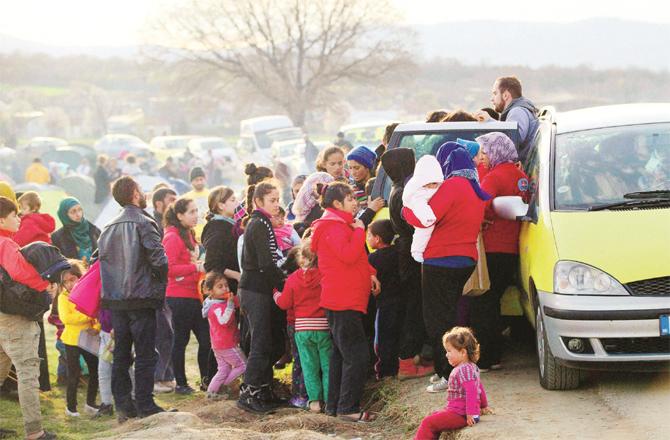 Queue for immigrant vehicles in a village in Greece. (AP / PTI)