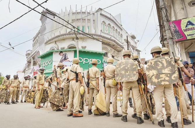 A large number of police can be seen outside the mosque in Atala, Allahabad..Picture:INN