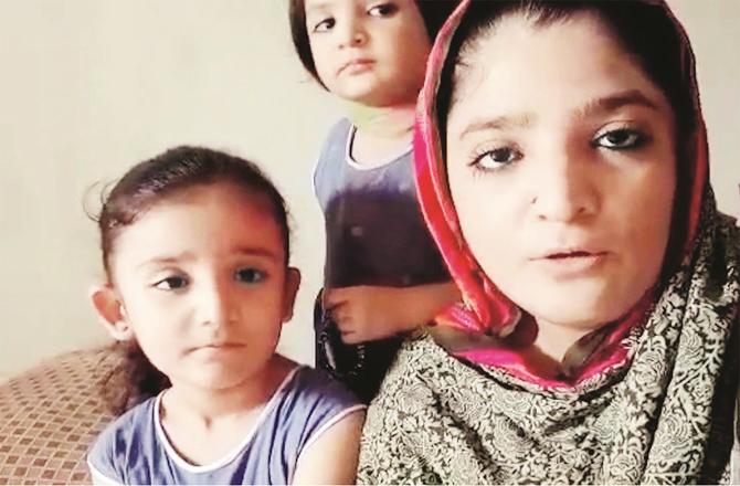 Zainab and her two daughters Ayesha and Amna